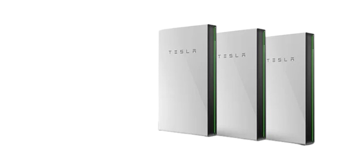 Two Tesla Powerwall units mounted on a wall.